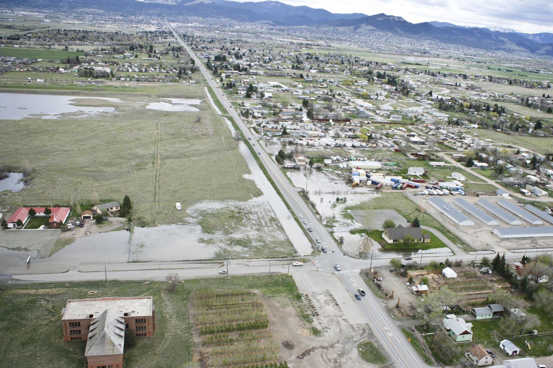 Flooding in the Helena Valley is shown via helicopter